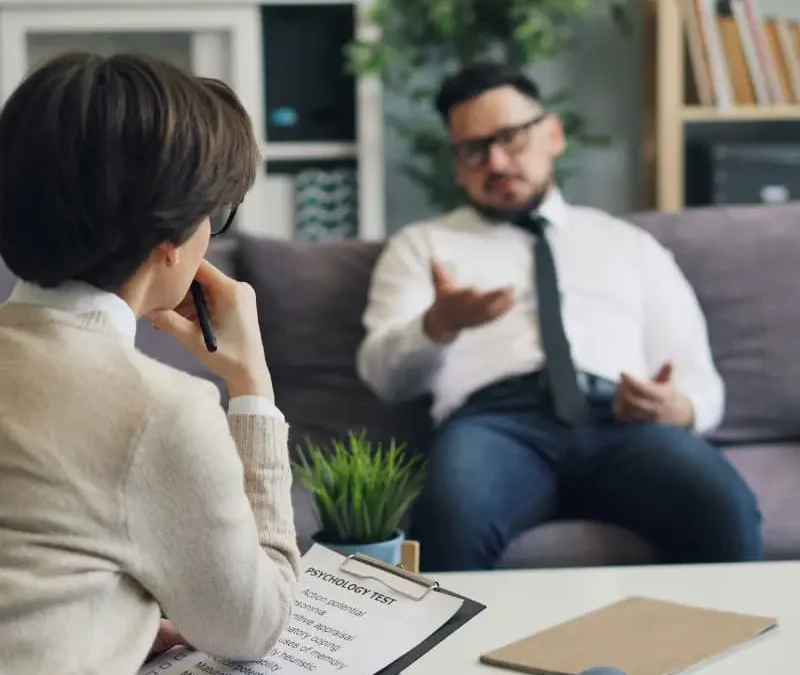 psychologist conducting an assessment